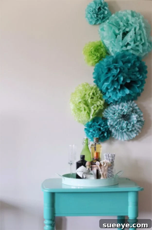 Colorful Tissue Paper Pom Pom Wall Decor: Easy & Fun Joyful DIY Tissue Paper Pom Poms Wall Art for a festive display