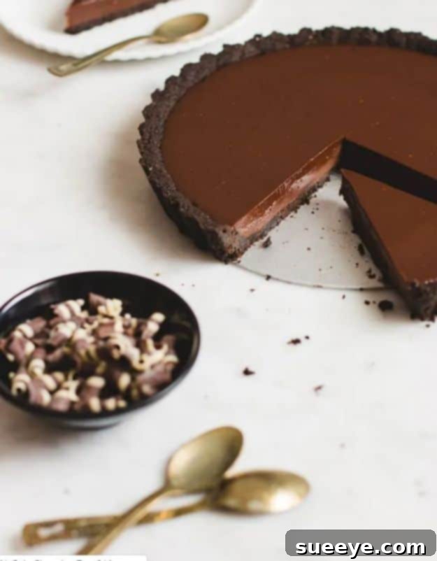 No Bake Dessert Recipes | No Bake Chocolate Tart - Quick Dessert Ideas and Easy Sweets You Can Make Without Baking - Healthy Cookies and Pie Decadent No-Bake Chocolate Tart with a rich ganache filling on an Oreo crust, perfect for quick dessert ideas.