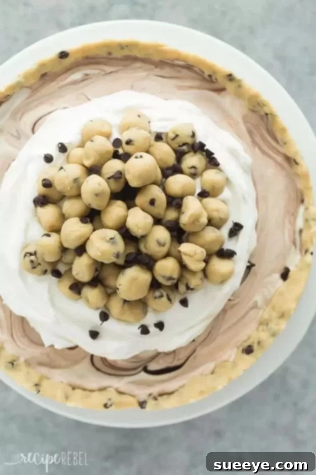 No Bake Desserts | Cookie Dough Ice Cream Cake - Quick Dessert Ideas and Easy Sweets You Can Make Without Baking - Healthy Cookies and Pie Indulgent Cookie Dough Ice Cream Cake, a no-bake dessert featuring layers of cookie dough and ice cream.