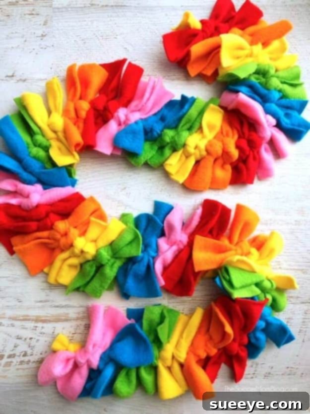 No-Sew Rainbow Fleece Scarf No Sew Gifts to Make - Easy DIY Christmas Presents -Easy Rainbow No Sew Fleece Scarf