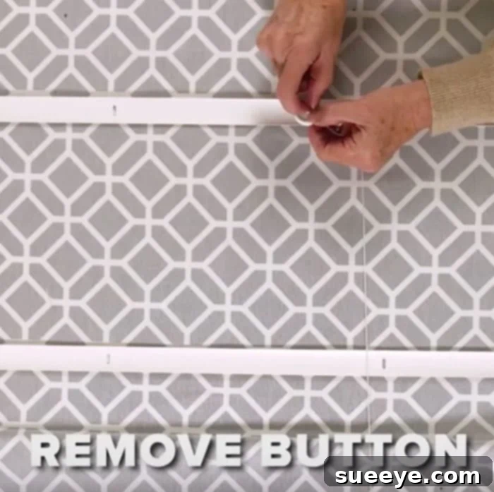 Turn a Mini Blind into a Roman Shade for Just 12 Dollars 11 Re-threading pull cords and securing on bottom bar for DIY roman shades