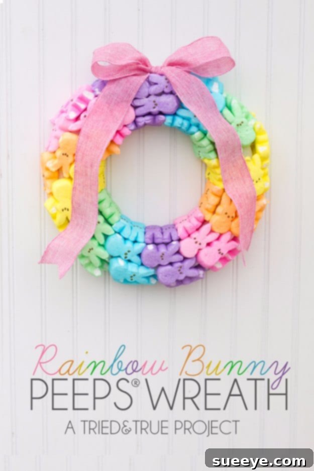 48 Creative DIY Easter Decor Projects 4 Colorful wreath made from various marshmallow bunny Peeps, arranged in a rainbow pattern.
