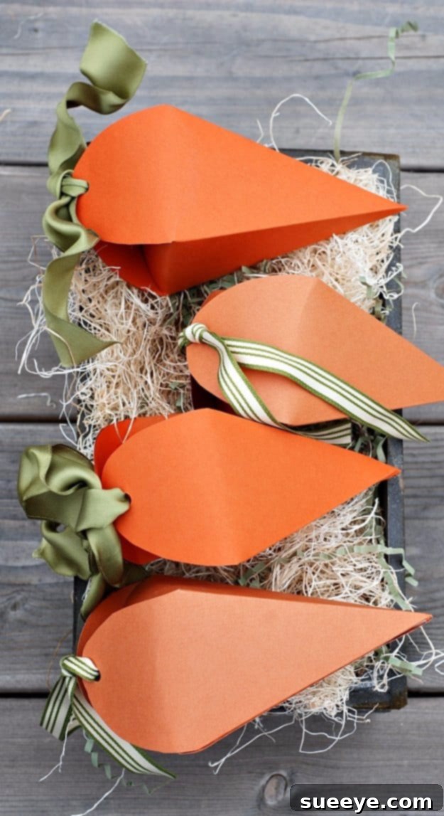 48 Creative DIY Easter Decor Projects 36 Small, handmade treat boxes shaped like carrots, perfect for Easter favors.