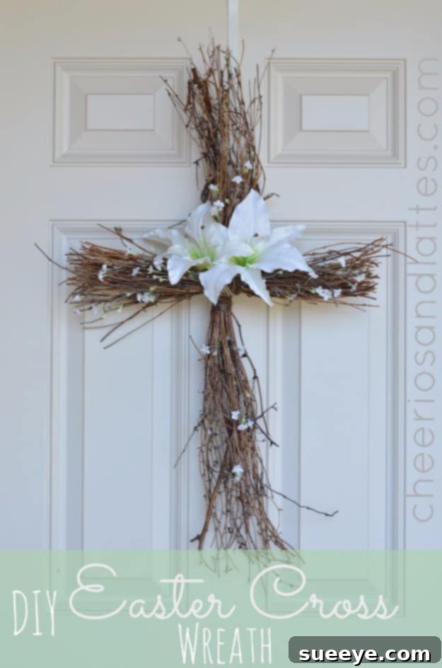 48 Creative DIY Easter Decor Projects 41 A beautifully decorated Easter cross wreath, adorned with flowers and natural elements.