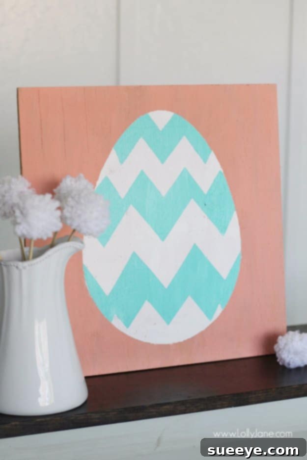 48 Creative DIY Easter Decor Projects 49 A decorative sign shaped like an Easter egg, adorned with spring-themed messages and designs.