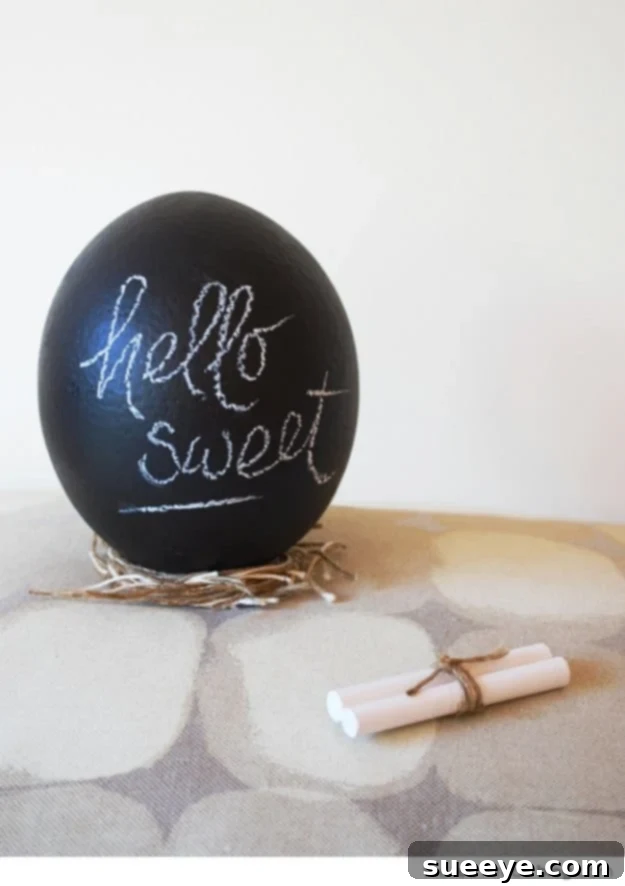 48 Creative DIY Easter Decor Projects 9 Large Easter eggs painted with chalkboard paint, displaying handwritten messages.