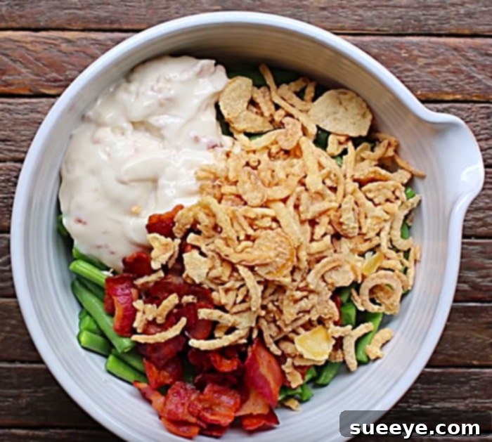 Comforting Slow Cooker Green Bean Bacon Casserole 2 Make green bean and bacon casserole for Thanksgiving