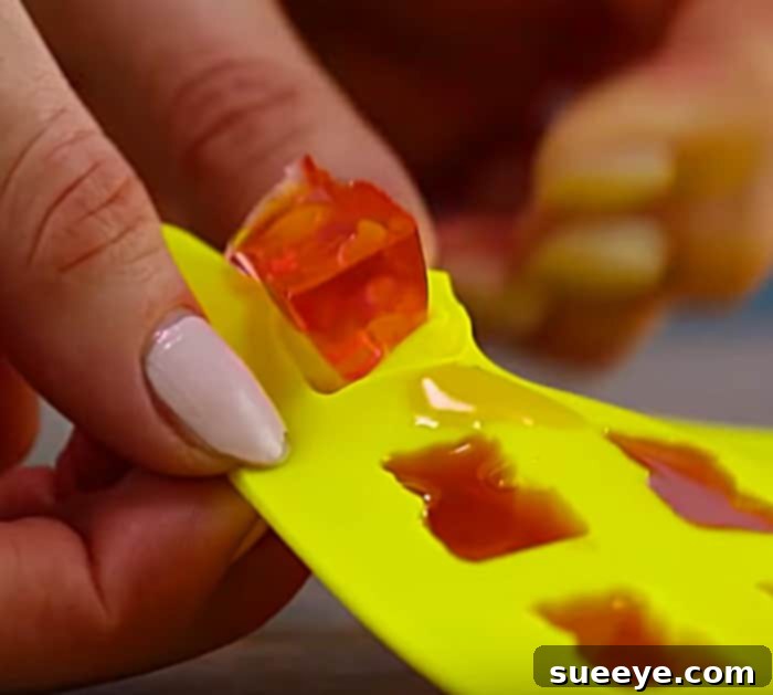 Finished DIY Rose Wine Gummy Bears Popping Out of Silicone Molds
