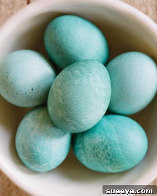 Easter eggs with delicate lace patterns created through dyeing