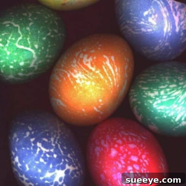 Bright and swirling psychedelic Easter eggs with tie-dye effects