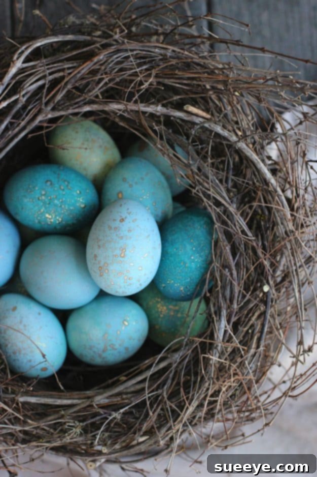 Beautiful robin's nest eggs with blue speckled patterns, perfect for Easter