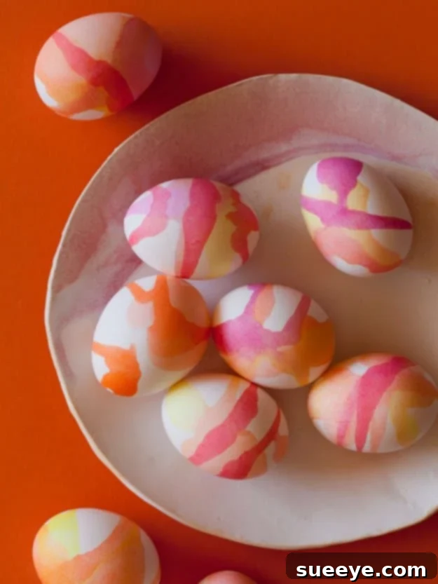 Soft, artistic watercolor Easter eggs with blended colors