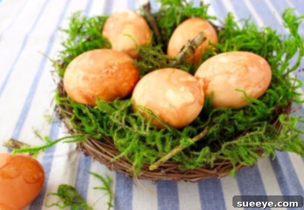 Naturally dyed Easter eggs with onion skins, showcasing warm, earthy colors