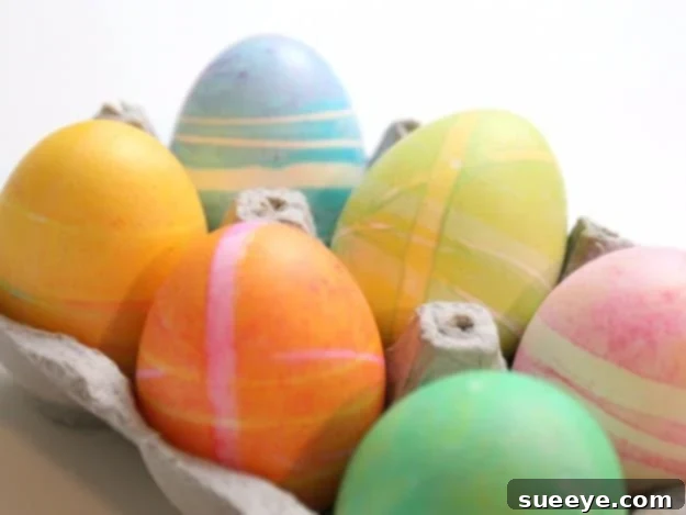 Easter eggs dyed with rubber bands, creating cool striped patterns