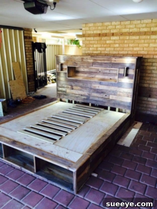 DIY Pallet Furniture Ideas - DIY Pallet Bed with Headboard and Lights - Best Do It Yourself Projects Made With Wooden Pallets - Indoor and Outdoor, Bedroom, Living Room, Patio. Coffee Table, Couch, Dining Tables, Shelves, Racks and Benches DIY Pallet Bed with Headboard and Lights - Rustic Bedroom Furniture