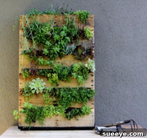 DIY Pallet Furniture Ideas - DIY Pallet Vertical Planter - Best Do It Yourself Projects Made With Wooden Pallets - Indoor and Outdoor, Bedroom, Living Room, Patio. Coffee Table, Couch, Dining Tables, Shelves, Racks and Benches DIY Pallet Vertical Planter - Space-Saving Garden Idea