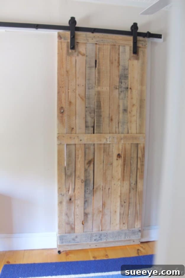 DIY Pallet Furniture Ideas - DIY Pallet Sliding Barn Door - Best Do It Yourself Projects Made With Wooden Pallets - Indoor and Outdoor, Bedroom, Living Room, Patio. Coffee Table, Couch, Dining Tables, Shelves, Racks and Benches DIY Pallet Sliding Barn Door - Rustic Interior Design Feature