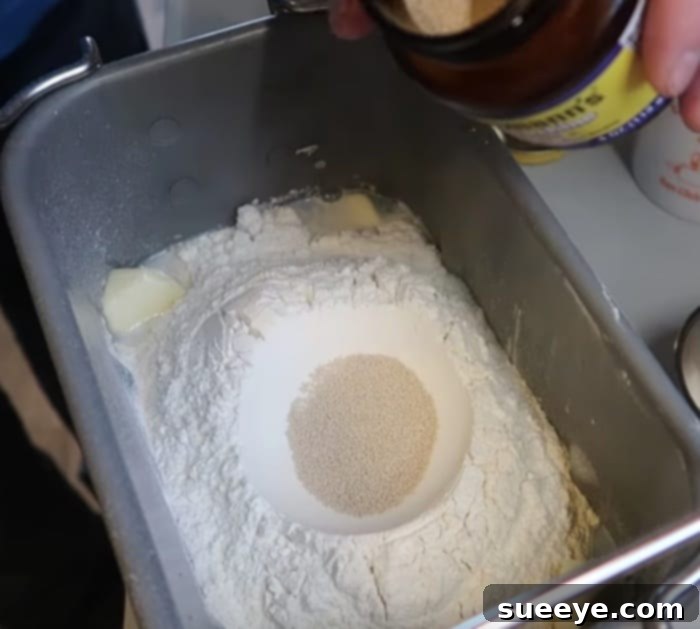 Easy Bread Machine Sandwich Bread 2 Adding ingredients to a bread machine