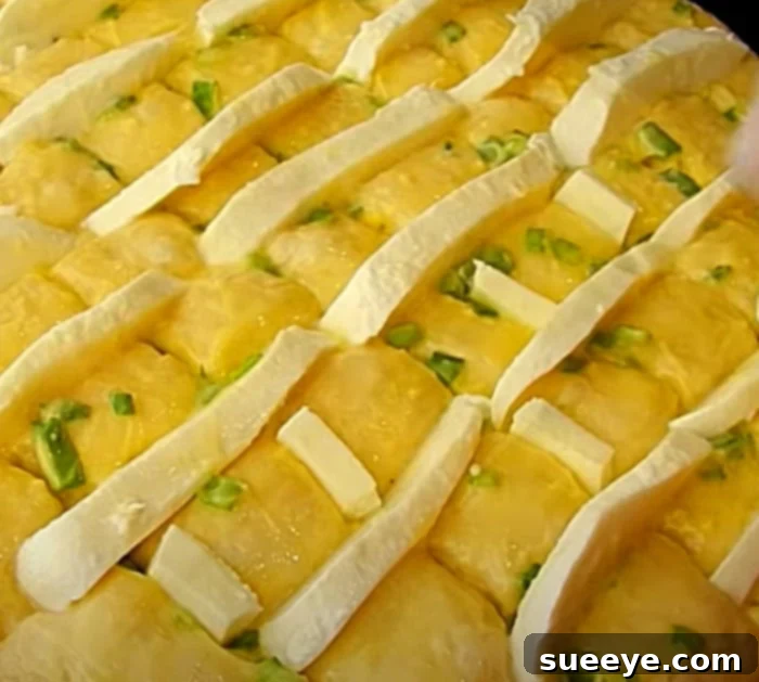 Melted Mozzarella Garlic Bread 3 Close-up of garlic butter bread with mozzarella being prepared from scratch
