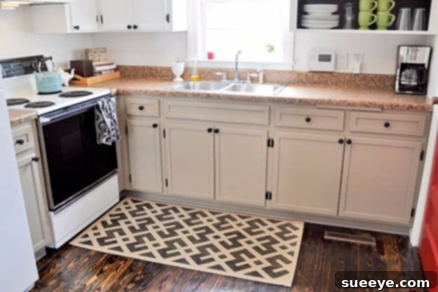 DIY Kitchen Cabinet Embellishment with Trim Custom Cabinet Molding Addition
