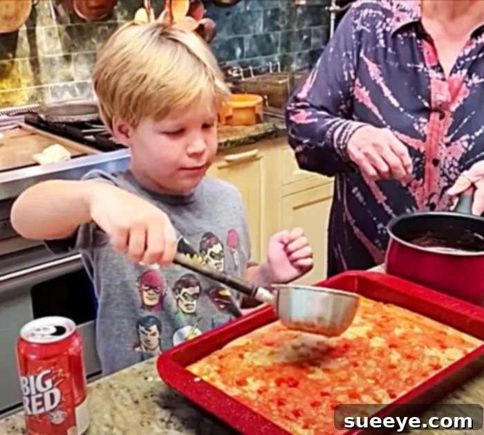 How to Make a Poke Cake With Big Red Soda - Recipe and Tutorial -Pour Big Red Syrup Over A Texas Poke Cake How to Make a Poke Cake With Big Red Soda - Recipe and Tutorial -Pour Big Red Syrup Over A Texas Poke Cake