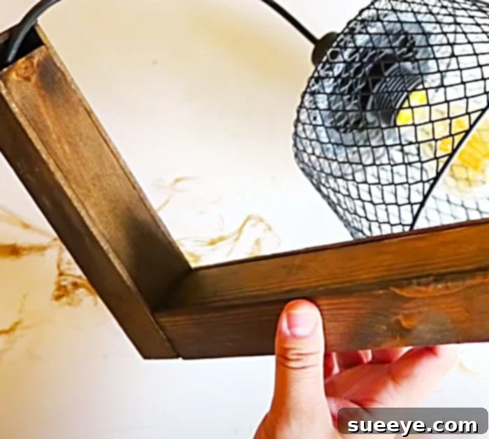 Staining Paint Sticks for DIY Wall Sconces Stain Paint Sicks With Minwax To Make DIY Wall Sconces - Lighting Ideas - Dollar Tree Projects
