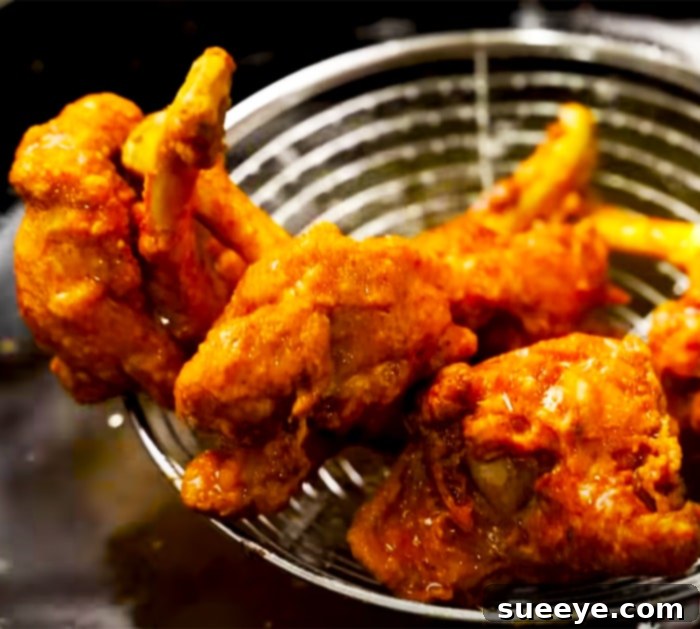 Perfect Crispy Chicken Lollipops 3 Crispy Fried Chicken Lollipops Before Adding Sauce - A Delicious Drumstick Recipe Step