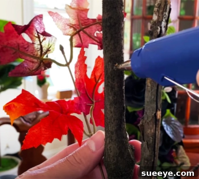 Transforming Branches into Autumn 2 Crafting a Beautiful DIY Fall Tree: Attaching Leaves to Create a Realistic Autumn Display
