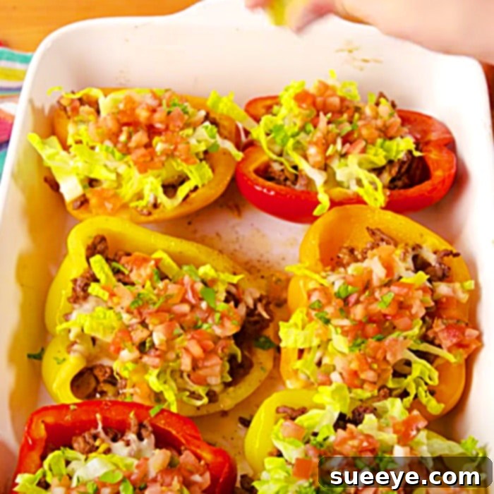 Flavor-Packed Taco Peppers 3 Taco Stuffed Peppers Recipe - Easy Dinner Ideas - Stuffed Bell Pepper Meal