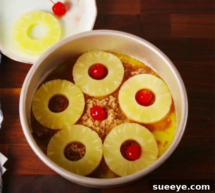 Tropical Twist: Pineapple Upside-Down Cheesecake 2 Homemade Pineapple Upside Down Cheesecake made with a boxed cake mix recipe for an easy dessert. Perfect for parties and family gatherings.