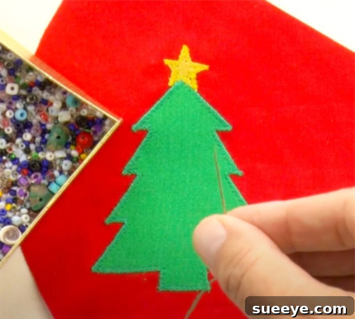 DIY Christmas Face Mask Free Pattern 3 Close-up of a DIY Christmas face mask showcasing decorative seed beads stitched onto the Christmas tree design, offering unique handmade gift ideas.