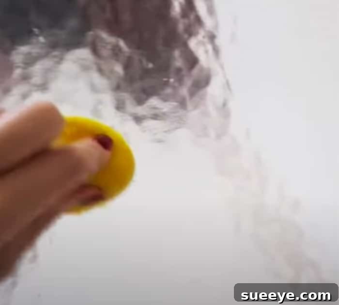 Sparkling Shower Doors: Erase Scum and Hard Water Stains 2 Use Acidity to Remove Water Build Up From Showers - Use Baking Soda and Vinegar to Clean Showers