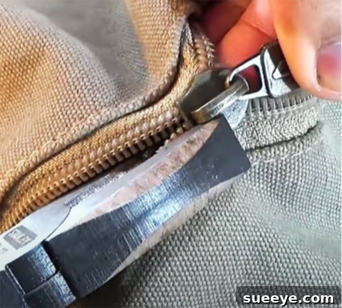 Fix Your Broken or Split Zipper 2 Use Pliers to Fix Broken Zipper - Fix A Zipper Off Track - Simple Clothing Trick