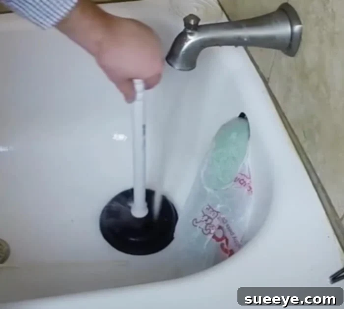 Bathtub Clog Buster: 5-Minute Method 3 Learn the best way to fix a slow draining tub in 5 minutes using a plunger effectively. DIY guide for bathtub drain clogs.