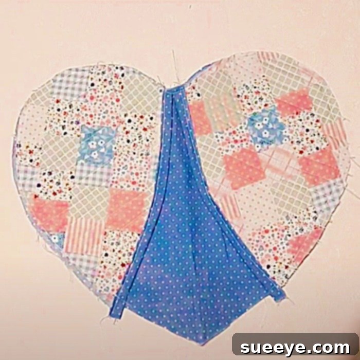 Quick Sewing Gift Ideas - Easy Quilt Pattern - Free Quilt Pattern - A finished heart-shaped oven mitt, showcasing the simple quilting style and adorable design, perfect for DIY gifts.