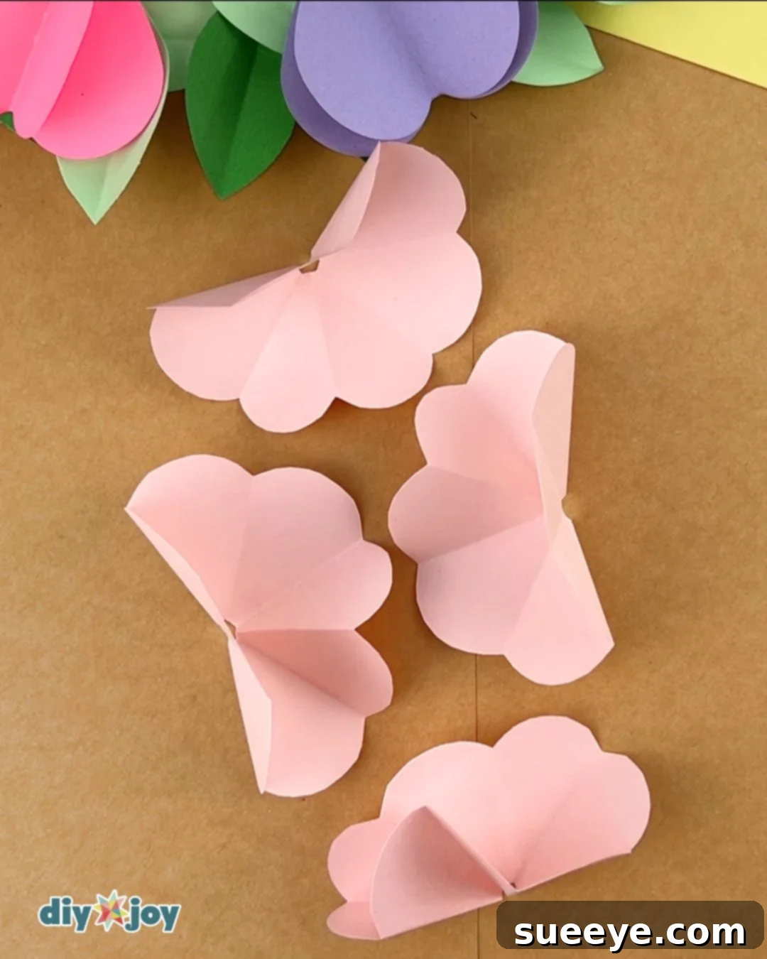 Image displaying the four identical paper pieces ready for the next steps.